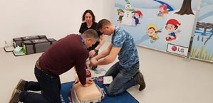 Training participants practice first aid