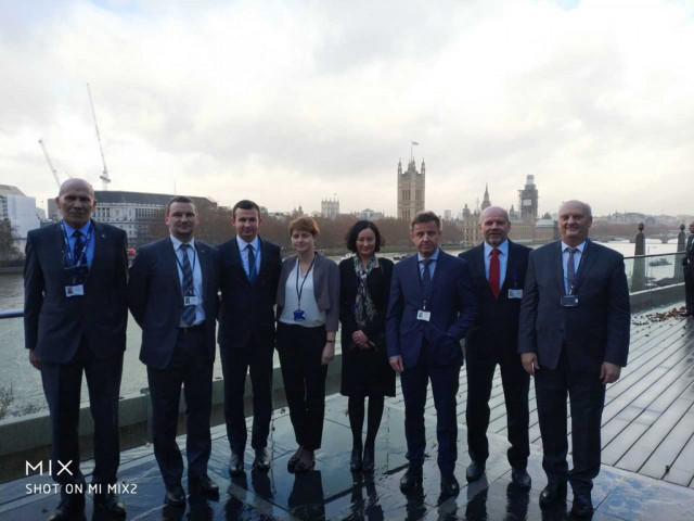 Representatives of the Polish delegation in the 100th Session of the Maritime Safety Committee, London 2018. From the left-hand side: Paweł Perkowski - a delegation member; Wojciech Zdanowicz – a delegation member; Cezary Puchacz – Deputy Head of the delegation; Hanna Słąba – a delegation expert; Magdalena Kierzkowskia – a delegation member; Przemysław Lenard – a delegation member; Tadeusz Wojtasik – Deputy Head of the delegation, Zbigniew Pietrzykowski - a delegation expert