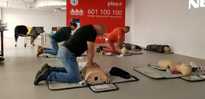 Training participants practice first aid