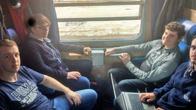 Participants of the New Horizons project on the train returning home