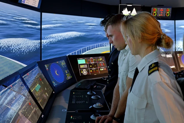 MUS student performs an exercise at the bridge simulator