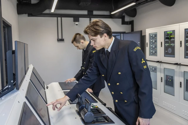 MUS students perform an exercise at the power engine room simulator