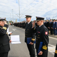 Wręczanie odznaczenia przez Sekretarza Stanu A. Marchewkę i Rektora PM W. Ślączkę