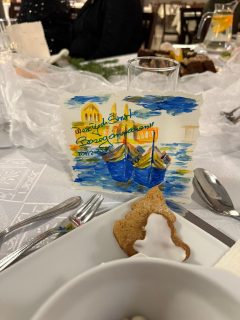 Pocztówka z życzeniami świątecznymi  przedstawiająca dwa statki 